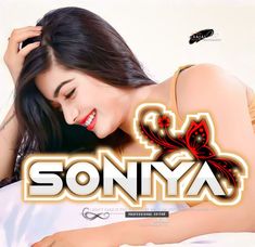 a woman laying on top of a bed next to a white wall with the words sonya