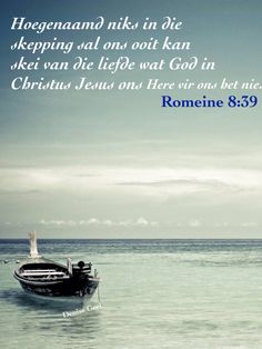 a boat floating on top of the ocean with a bible verse written in blue above it