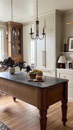 a large kitchen island in the middle of a room