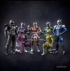 five different types of action figures are posed in a row on a dark background,