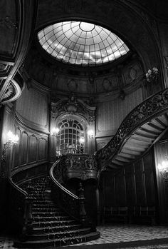 an ornate staircase in the middle of a building