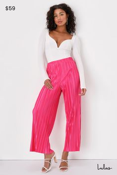 Be ready for warmer days with the Lulus Tropical Temperatures Hot Pink Satin Plisse Wide-Leg Pants! Plisse pleated woven satin shapes these breezy pants that have an elasticized high waist and relaxed, wide legs that end at raw-cut hems that are slightly cropped. All you need for the ultimate warm-weather look is a tank top and some chic sandals! Fit: This garment fits true to size. Length: Ankle length. Size medium Inseam: 27.50 Front Rise: 12.00 Waist: Fitted - elastic waist allows stretch. Hi Pink Pleated Pants Outfit, Plisse Pants Outfit, Hot Pink Clothes, Bright Winter Outfits, Work Mood, Sheet Painting, Midsize Summer, Pants Satin, Hot Pink Outfit