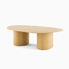 an oval wooden table sitting on top of a white background