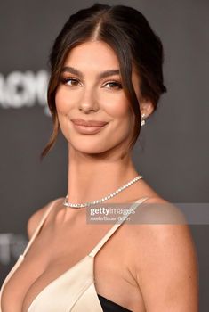 the actress and model is posing on the red carpet at the amfar fashion awards