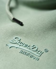 a close up of the logo on a sweatshirt