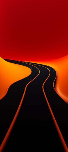 an orange and black desert with a road going through it