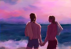 two people are standing on the beach looking out at the ocean while holding hands with each other