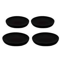 four black plates sitting on top of each other