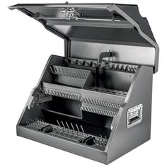 an automatic fryer is shown with the lid open and it's tray opened