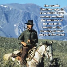 a man riding on the back of a white horse next to a mountain with a quote