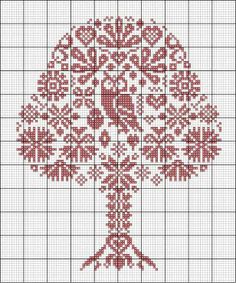 a cross stitch tree with red and white designs on the front, in a square pattern