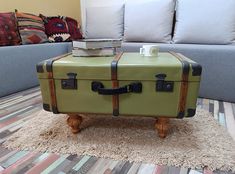 TravelTrunk Coffee table, End table with Wooden Legs, 1950s Suitcase Furniture, Trunk Side table with Storage The antique travel trunk was refurbished to very high standards and rebuild as coffee table with wooden legs.  The feet of the table are gorgeous vintage wooden feet. This awesome coffee table would look great anywhere in your hallway, living room, office or bedroom shop or restorant. It can be used as decaration too in any shop, restorant or coffe shop. It was fully hand restravation with a high qualyty new materials. Vintage Suitcase Coffee Table, 1950s Suitcase, Travel Trunk Coffee Table, Steamer Trunk Makeover, Suitcase Furniture, Trunk Makeover, Trunk Side Table, Suitcase Table, Diy Suitcase