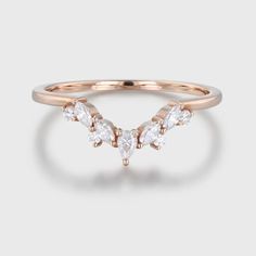 Curved Moissanite and Diamond Wedding Band in enchanting rose gold—a timeless and exquisite piece that makes for the perfect bridal promise and gift for her. Wedding Band Rose Gold, Curved Wedding Band, Bridal Bands, Diamond Wedding Band, Affordable Jewelry, Moissanite Diamonds, Lab Diamonds, Diamond Wedding Bands, Diamond Wedding