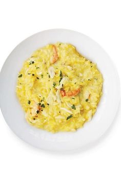 This luxurious seafood risotto features crab, shrimp and saffron. Mascarpone cheese mixed in at the end makes the rice extra creamy. Rice Dishes, Thermomix, Creamy Seafood, Seafood Risotto, Italian Seafood Recipes, Risotto Recipe, Risotto Recipes, Food And Wine, Fish Dishes