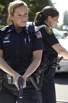 two police officers standing next to each other