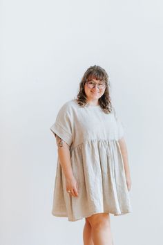 "The Boxy Babydoll Dress! Handmade 100% Linen, 5.3 oz One Size - fits sizes Small - X Large comfortably  Fit is boxy, loose, flowy Woman in photo is wearing #1 - Mix Natural Her measurements are 38\" bust, 32\" waist, 45\" hips, and 4'11\" tall 25\" pit to pit, 14\" shoulder to waist, 34\" full length, 9\" arm opening Color options: 1 - Mix Natural 2 - White 3 - Black Made to order, please allow 3-4 weeks before shipping If you're looking for another color, please send me a message and we can see if that color is available Sign up for my email list and get $5 off your next purchase! Plus, first-look at new launches, collaboration tops, and quilt jackets before anyone else. http://eepurl.com/ilO10E" Linen Babydoll Dress, Boxy Dress, Tunic Outfit, Boxy Top, Quilt Jacket, Dress Handmade, New Launch, Style Expert, Multiple Color