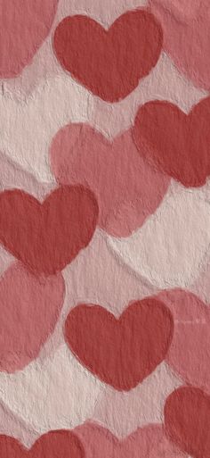 some red hearts on a pink and white background