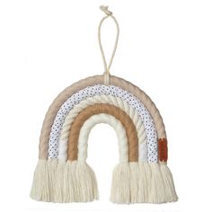 a white and brown hanging decoration with a rainbow