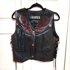 Genuine Leather Ladies Motorcycle Vest With Fringe Design And Red Rose Cut Out. New Without Tags. Has Extra Snaps. Size Medium. Approximate Measures Are From Back Shoulder To Shoulder 14 Inches. Front Length 19 And 1/2 Inches. From Armpit To Armpit In The Front Measurement Is Approximately 19 In.. Depending How You Like Your Fit, It Can Fit Up To 39" Breast Measurement. I Am 36 And It Fits Nice Too Sleeveless Leather Jacket, Leather Vest Outfit, Ladies Motorcycle, Brown Puffer, Motorcycle Vest, Pink Vest, Womens Puffer Vest, Black Puffer Vest, Black Puffer