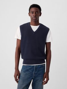 Soft, textured cotton sweater vest.  V-neck.  Sleeveless.  Banded hem.  * Fit: Classic.  A straight & easy fit.  Hits at the hip.  Models are 6′1″–6′2″ 185 cm–188 cm) with a 31″ 79 cm) waist & 32–33″ 81 cm–84 cm) inseam & are wearing Gap Denim Outfits, Sleeveless Sweaters, Baggy Jeans Outfit, Textured Sweater, Baggy Jeans, Dark Night, Sleeveless Sweater, Cotton Sweater, Jean Outfits