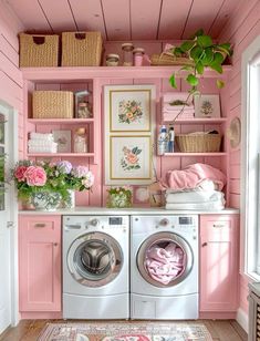 a washer and dryer in a pink laundry room with flowers on the shelves