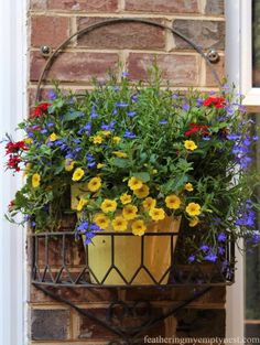 a potted planter filled with colorful flowers