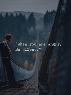 a person standing on a bridge with the words, when you are angry, be silent