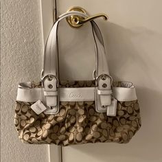 Nwt Coach Signature Collection Purse White And Tan Inside Is A Coffee Tan Color Approx. Measurements: 15in X 8in X 6in (See Photos) Bought Years Ago And Never Used It! It’s Been Sitting On My Shelf In My Closet! Purse White, Vintage Coach Bags, Girly Bags, Cool Fits, Pretty Bags, Essential Bag, Vintage Coach, Girls Bags, Cute Bags