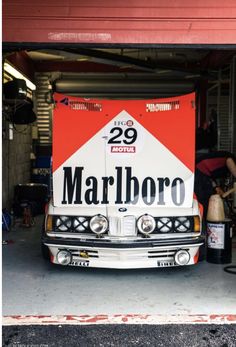 a truck parked in front of a garage