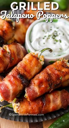 grilled jalapeno poppers on a plate with ranch dip