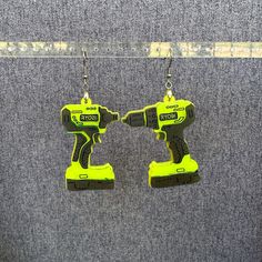 Need the perfect accessory to proclaim your love of home repair? Well look no further than these handmade Ryobi Drill/Impact Driver earrings! A guaranteed conversation starter at your local bar or Home Depot. *also available in a cute pastel version! see other listing! Home Repairs, Ryobi Drill, Home Depot Paint, Paint Buckets, Earrings Classic, Impact Driver, Drill Driver, Acrylic Earrings, Home Repair