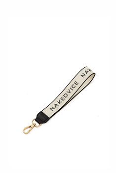 a keychain with the words make love not written on it