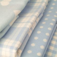 blue and white fabric with polka dots on it