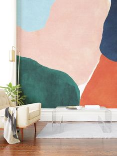 a living room with a painting on the wall
