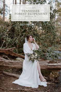 a woman in a white dress sitting on a log with her legs crossed and holding a bouquet