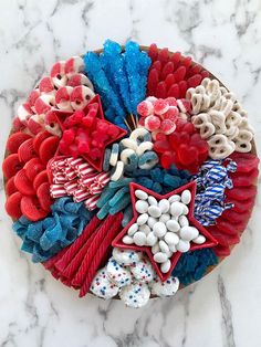 a cake with red, white and blue decorations on it