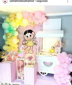 a room with balloons and decorations on the wall