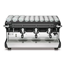 an espresso machine with many cups on it