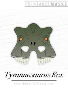 a paper mask with an image of a dinosaur's head on it and the words ty