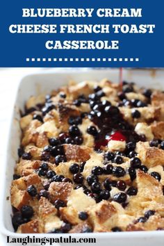 blueberry cream cheese french toast casserole in a white dish with text overlay