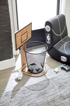 a glass filled with water sitting on top of a floor