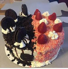 an oreo cake with strawberries and cookies on top