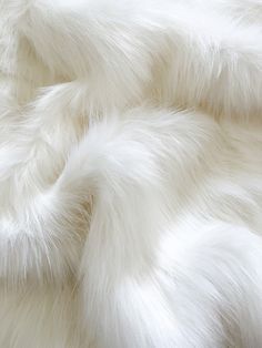 "Snow cat White is the sofest, shiniest purest white. This is a thick and plush faux fur fabric with a 2.5\" long pile, the fabric width is 64\". This is the fabric I use this faux fur to make my rave review poms! This soft, luxurious, and plush faux fur fabric is available in cuts from 6\" up to 5 yards in length. This fabric is perfect for various projects, including but not limited to pompoms, pillows, blankets, stuffed animals etc. Specs: -Made From: 80% Acrylic/20% Polyester -Woven Back -He Tela, Upcycling, Fur Aesthetic, Fur Background, Rave Review, Snow Cat, Dyed Tips, Fur Texture, Cat White