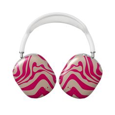 a pair of pink and white headphones with zebra print on the side, against a white background