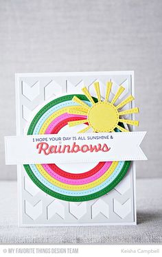 a handmade card with the words rainbows on it, and a sun in the middle