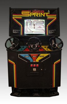 an old school arcade machine with the number twenty six on it's front wheel