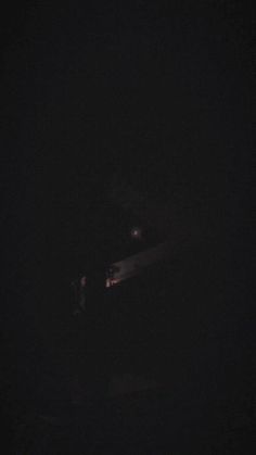 a blurry photo of a car in the dark