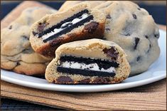 cookies with chocolate and white frosting are stacked on top of each other