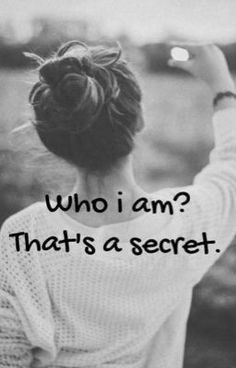 a woman is holding her hand up to the sky with an inscription that reads, who i am? that's a secret