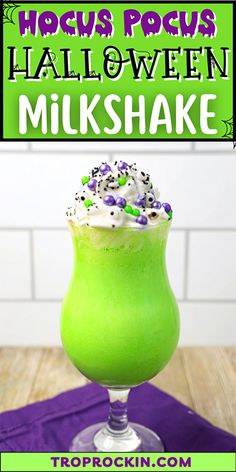 a green drink with sprinkles in it and the words hocps pocus halloween milkshake